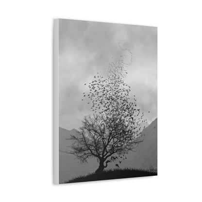 Canvas print of a silhouette of a tree with birds flying against a mountainous landscape.
